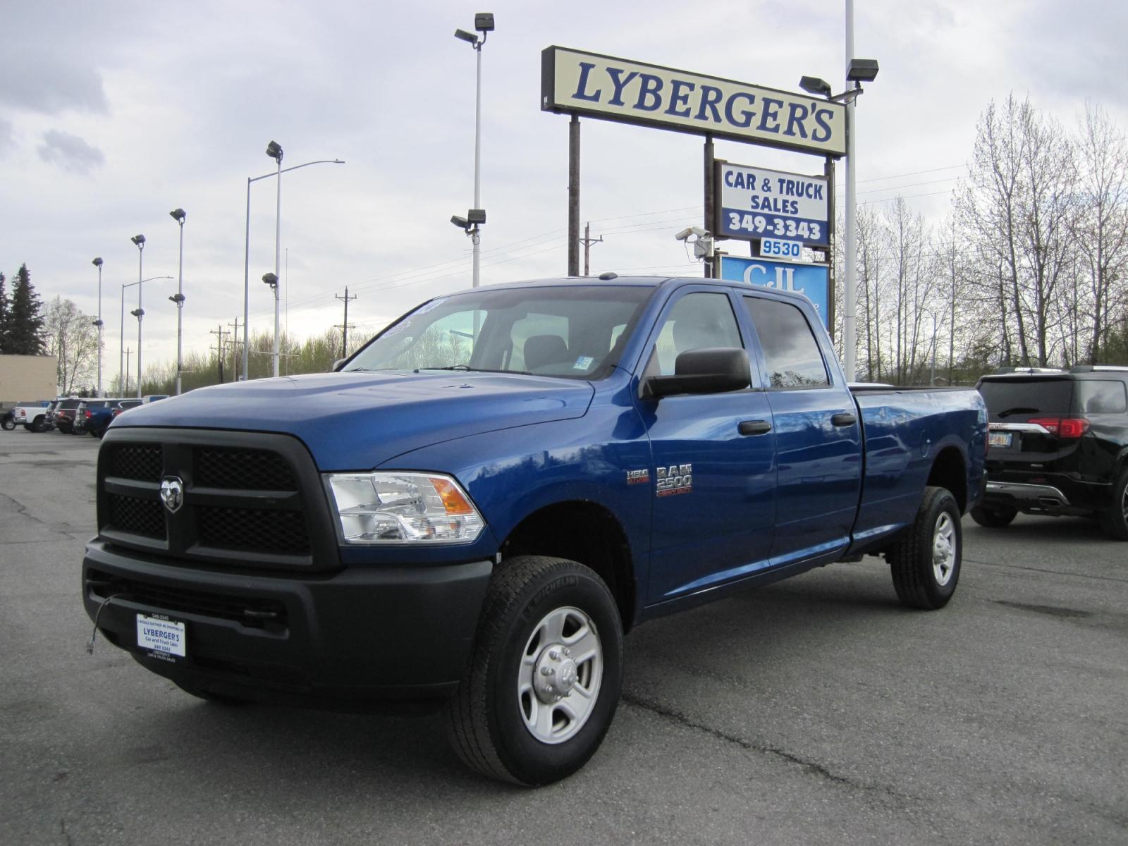 2014 blue /gray RAM 2500 Tradesman Crew Cab 4WD (3C6TR5HT1EG) with an 5.7L V8 OHV 16V engine, automatic transmission, located at 9530 Old Seward Highway, Anchorage, AK, 99515, (907) 349-3343, 61.134140, -149.865570 - Photo #1